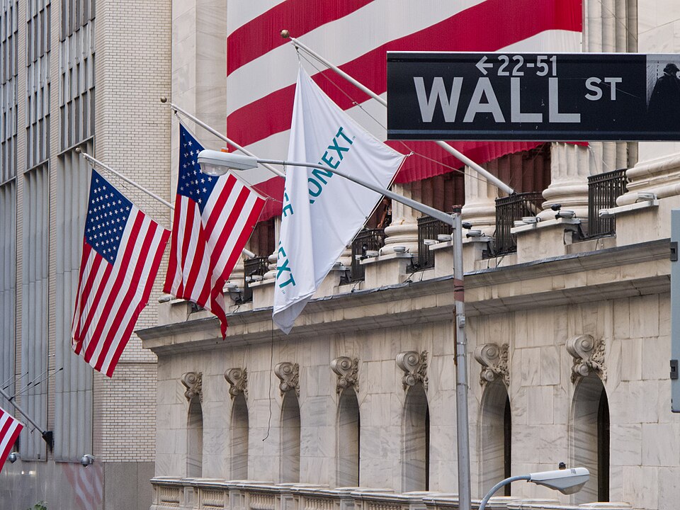 Wall Street and New York Stock Exchange exterior in Lower Manhattan