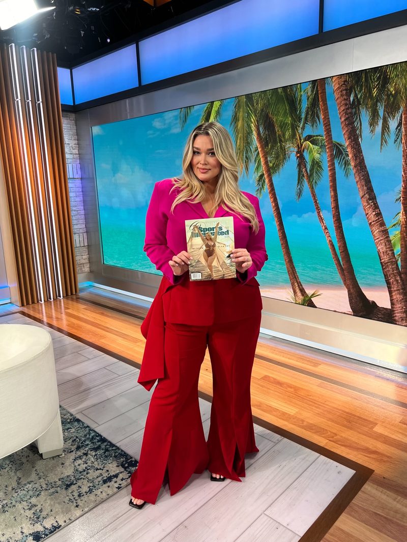 Hunter McGrady posing with her Sports Illustrated Swimsuit cover