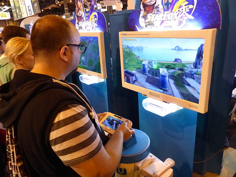Nintendo booth at Madrid Games Week 2015, showcasing Wii U gaming setups in a convention hall