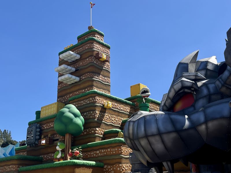Super Nintendo World themed area at Universal Studios Hollywood with colorful Mario-themed decorations